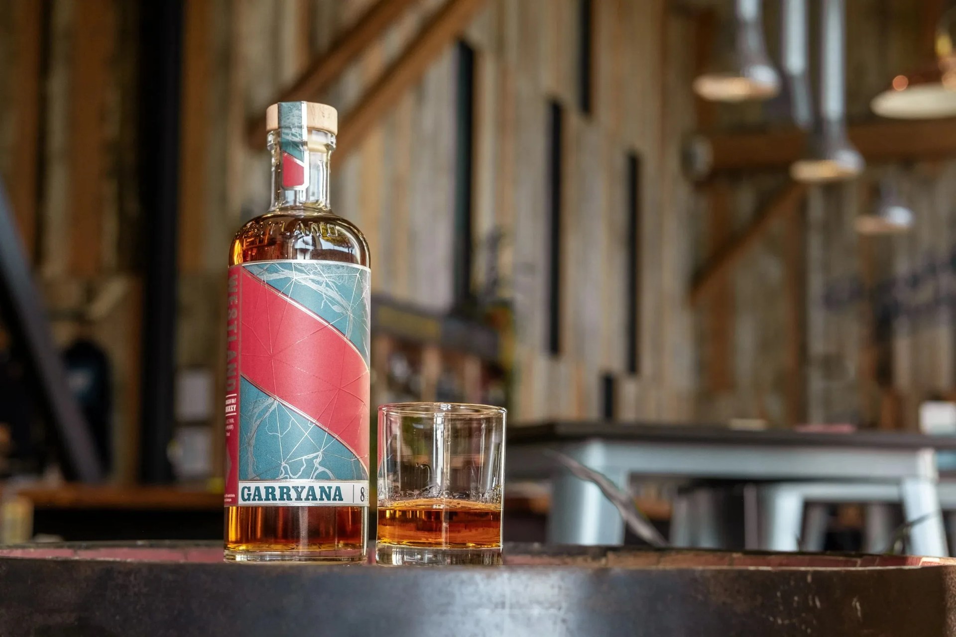 a bottle of whiskey and a glass