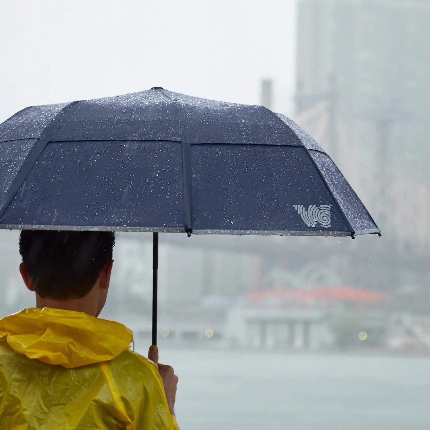 man using Weatherman Umbrella