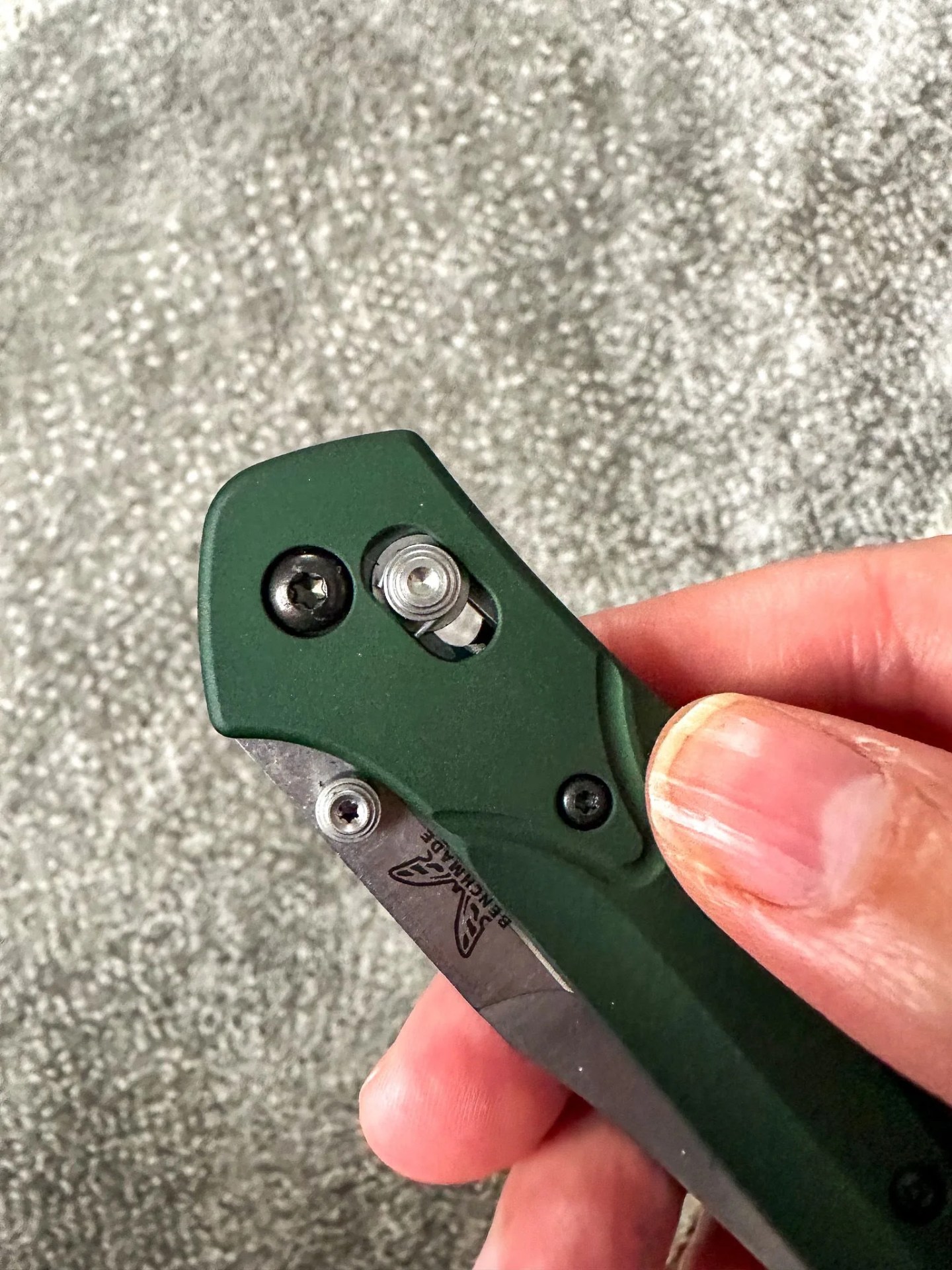 a hand holding a knife