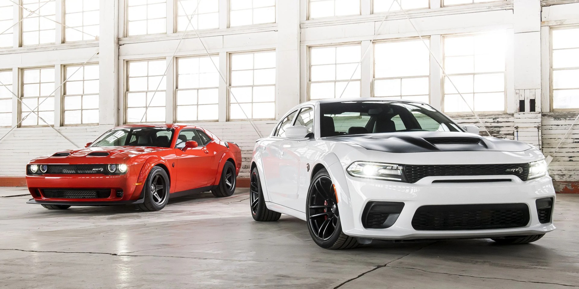 2022 dodge challenger srt super stock left and 2022 dodge charger srt hellcat right
