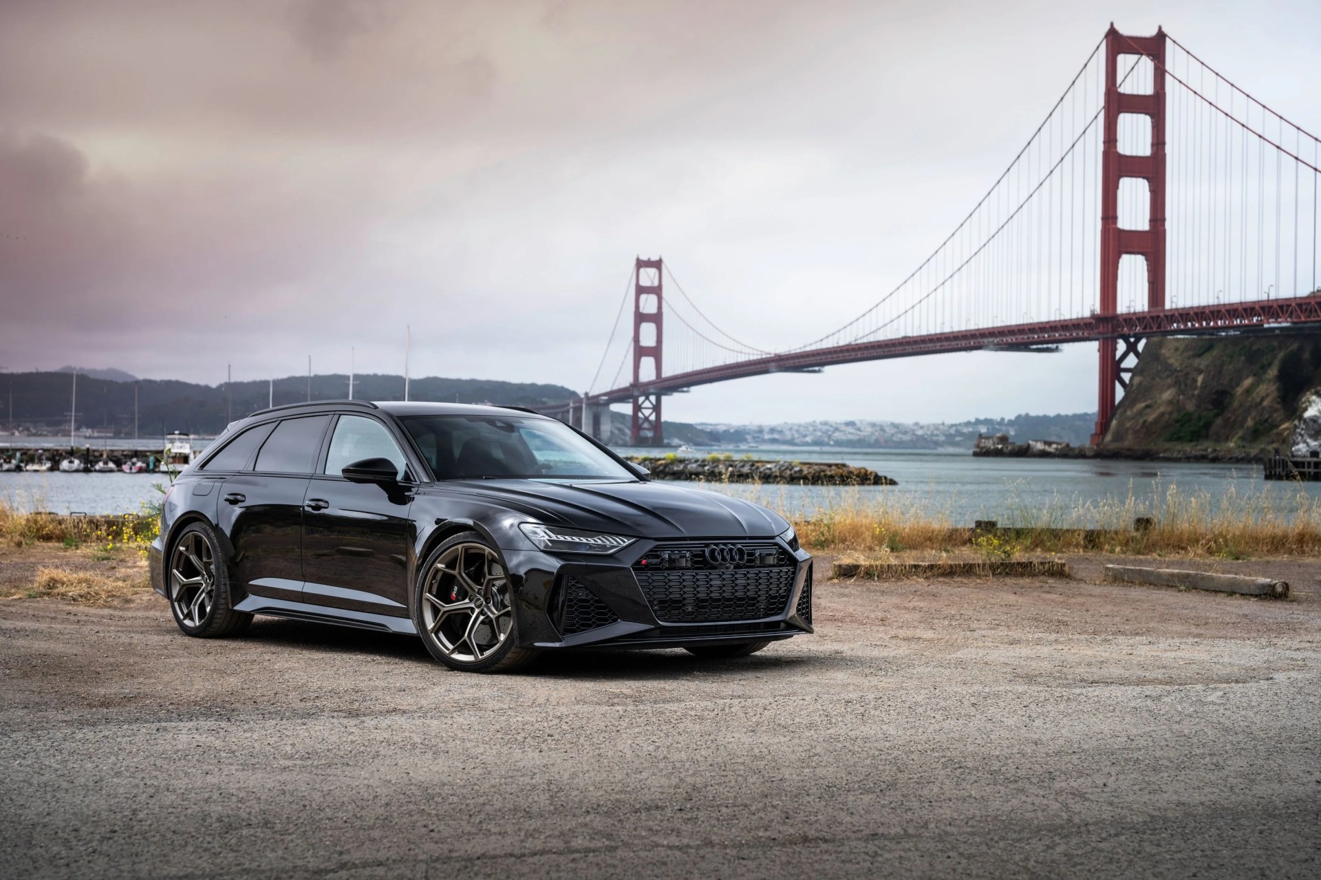 audi rs 6 avant in front of the golden gate bridge