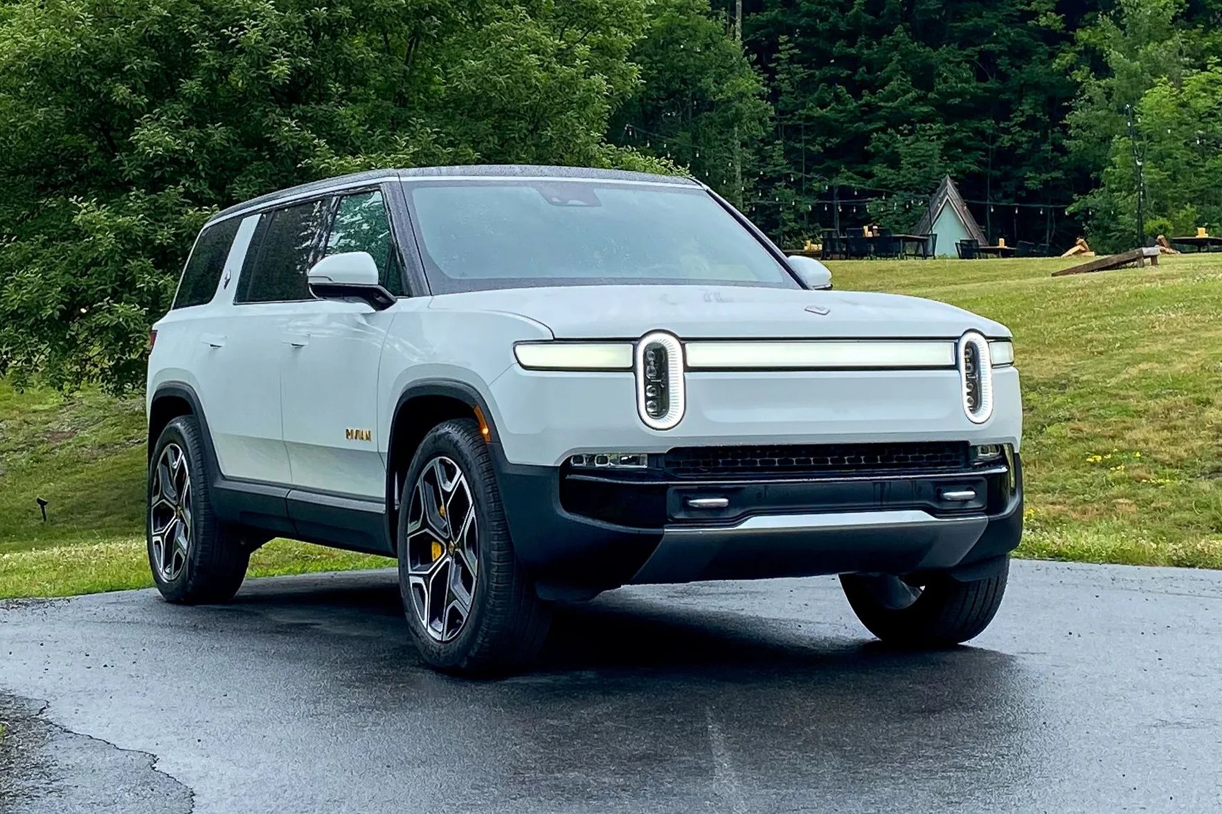 rivian r1s in a driveway