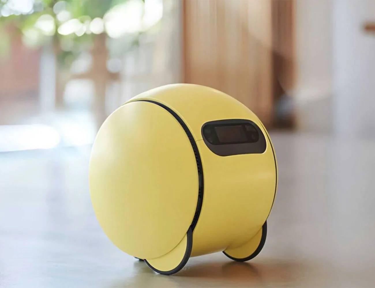 a yellow and black robot ball