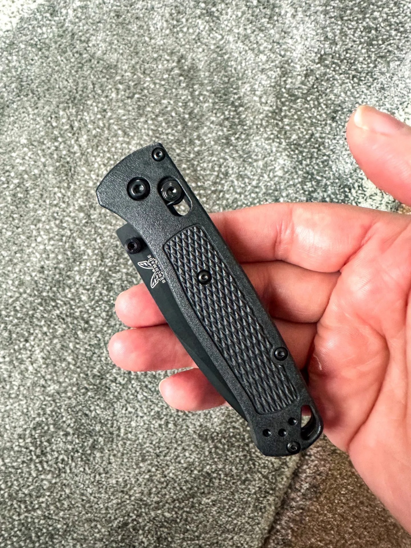 a hand holding a knife