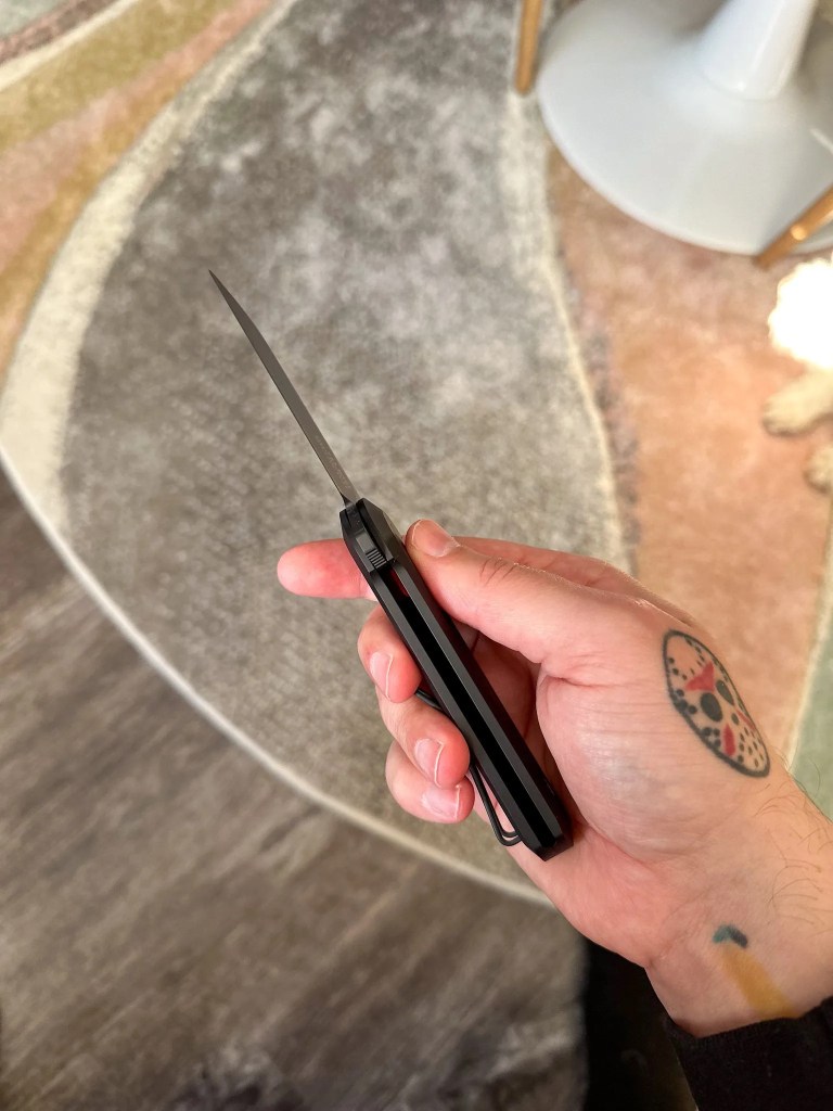 a person holding a knife