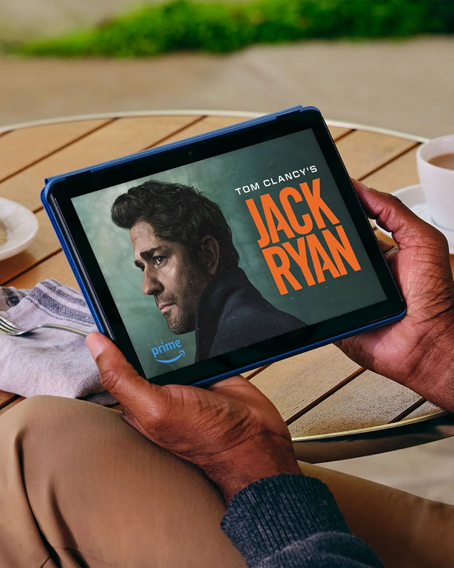 a person holding a tablet