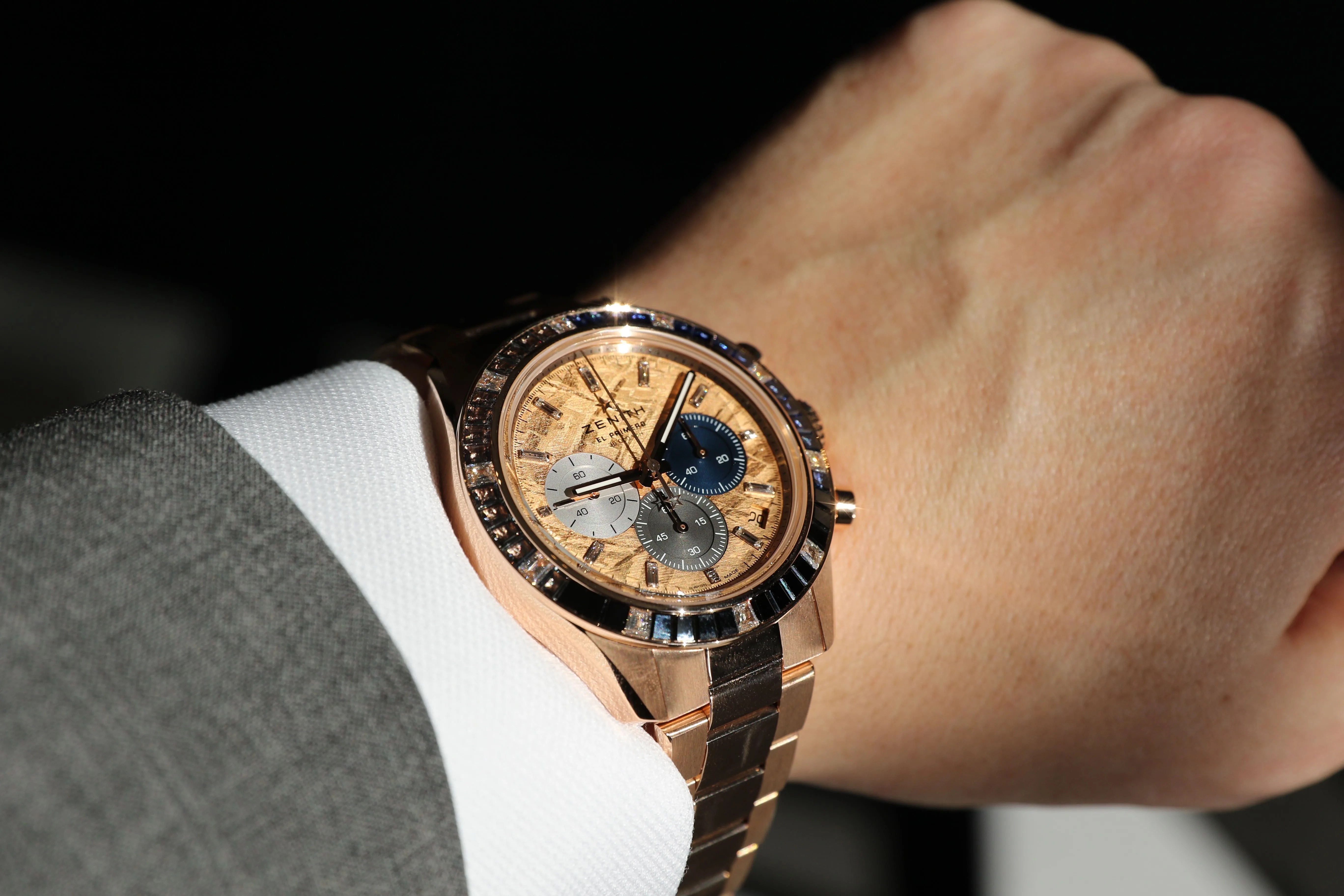 gold watch on wrist