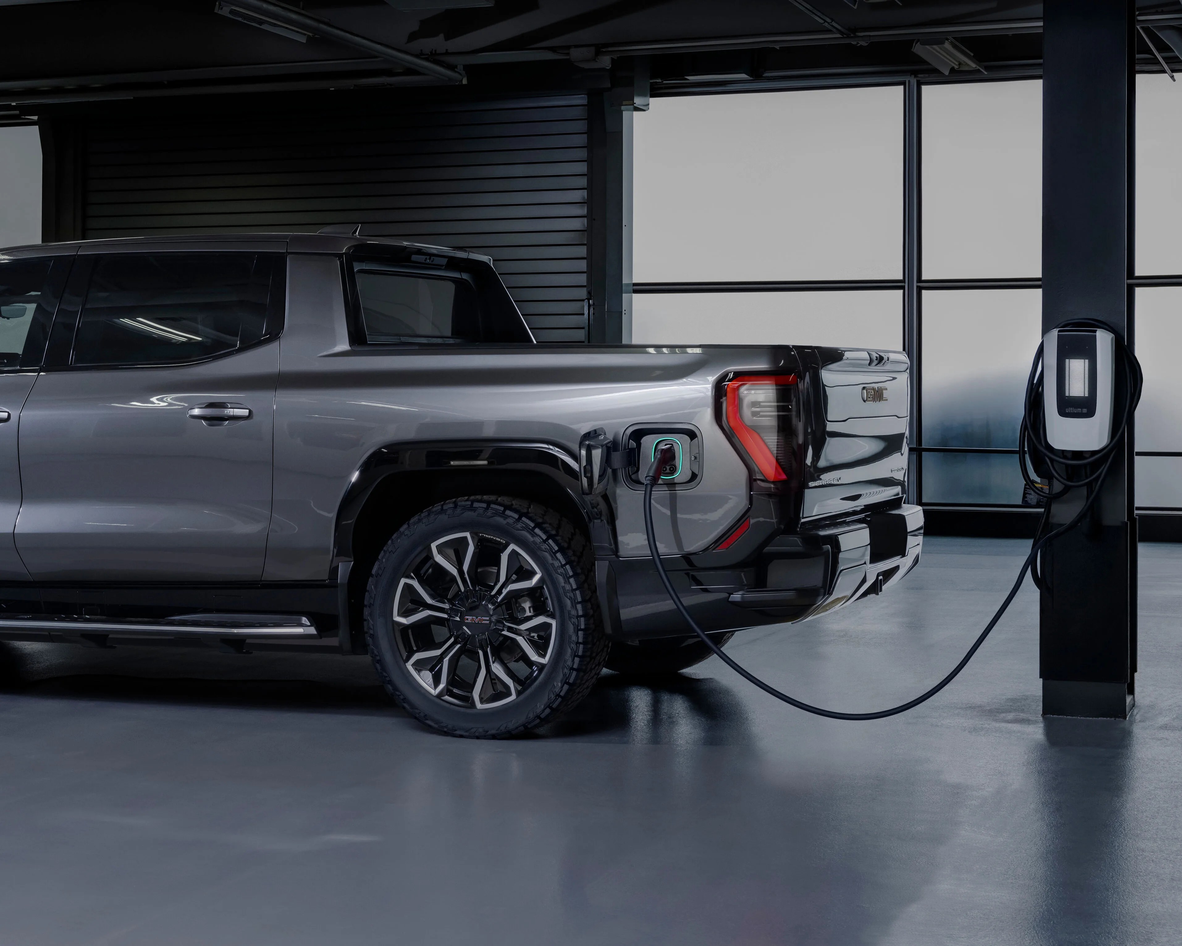 GMC Sierra EV on charger