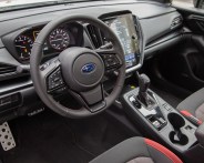 the steering wheel and dashboard of a 2024 subaru impreza rs