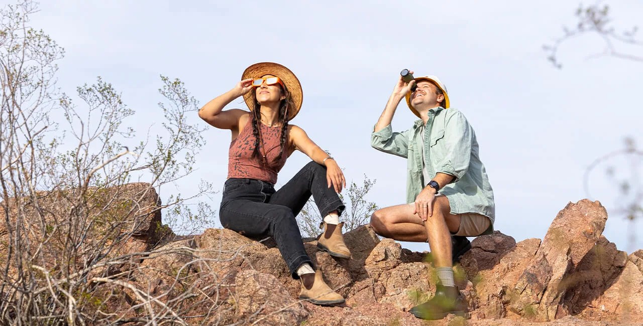 man looking at sky using Nocs Provisions binocular