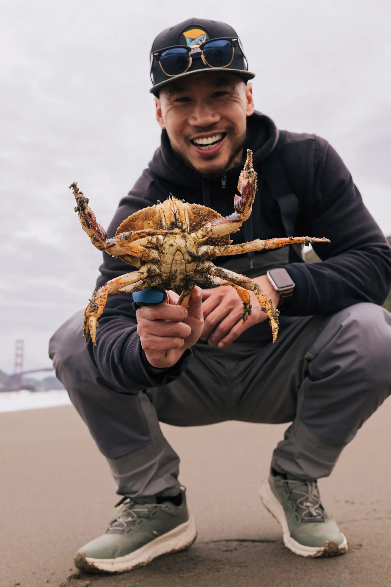 Daniel He holding a crab