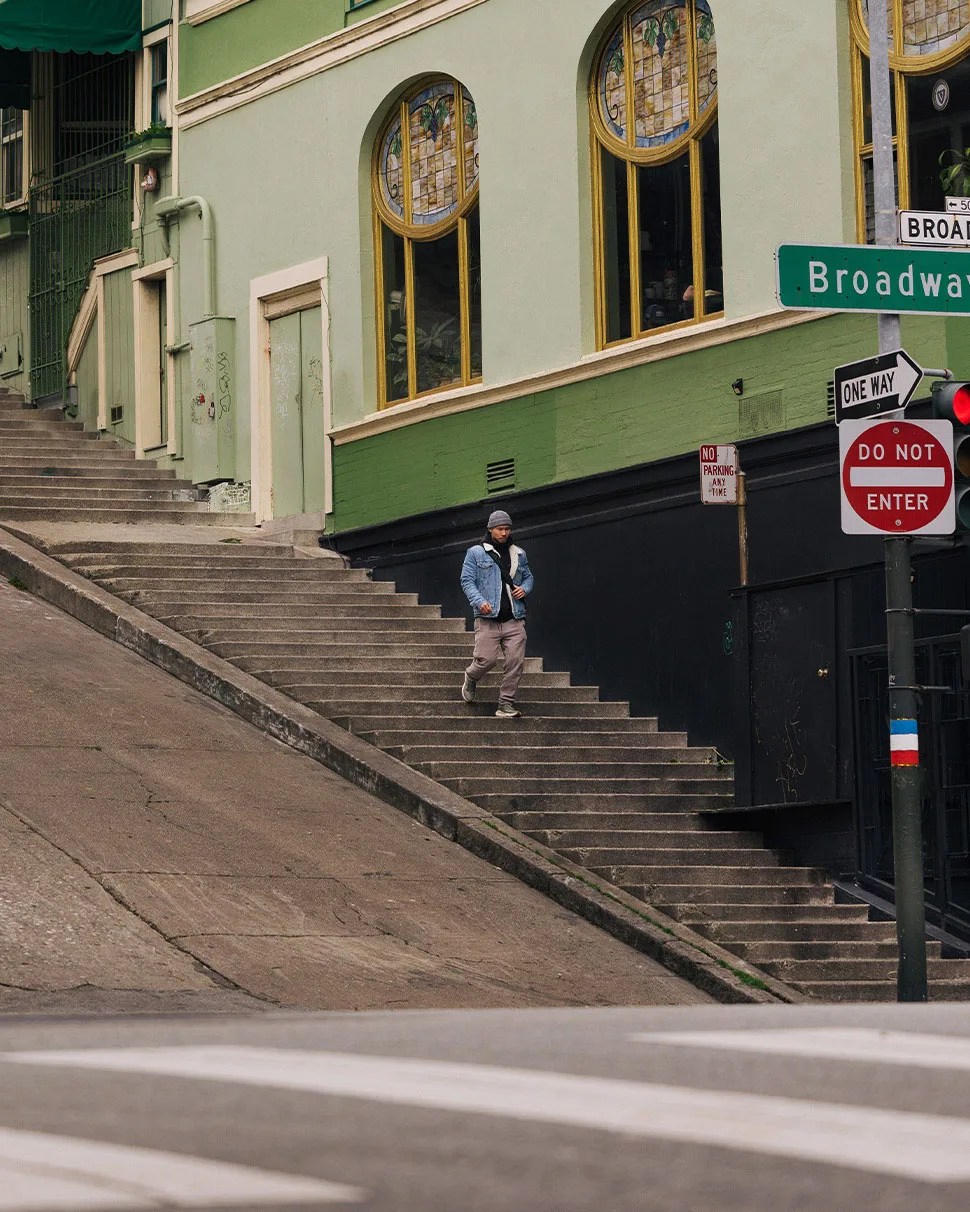 Daniel He walking in the streets of San Francisco