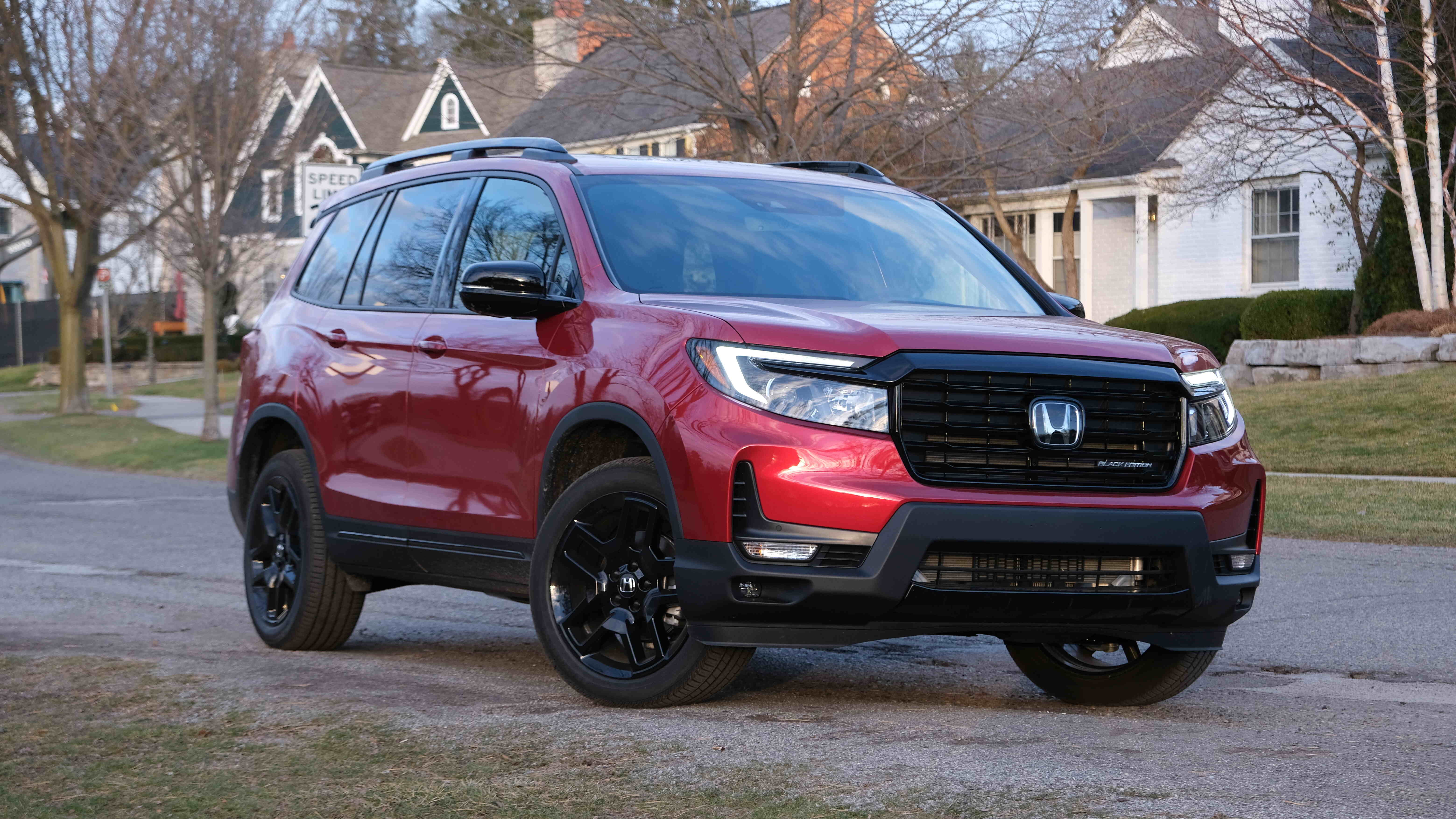 Honda Passport Black Edition parked in a neighborhood