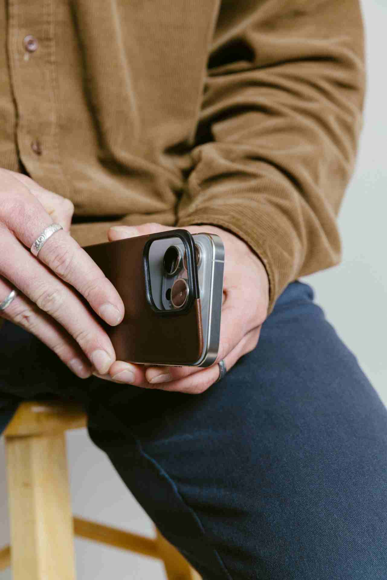 a person putting a case on a phone