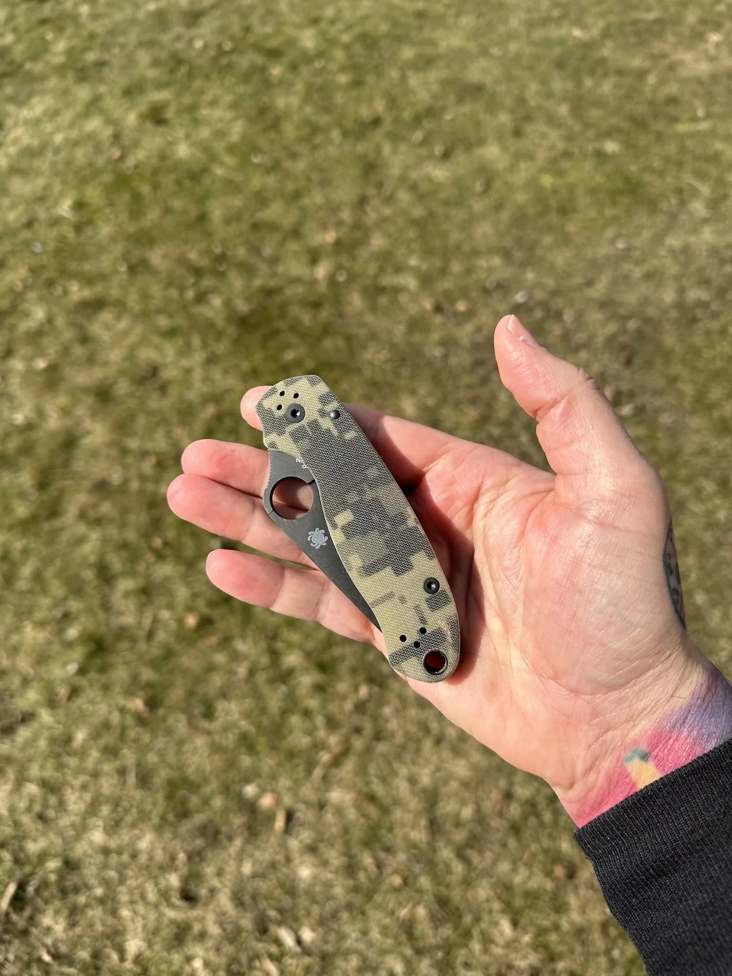 Pocket knife closed in a hand