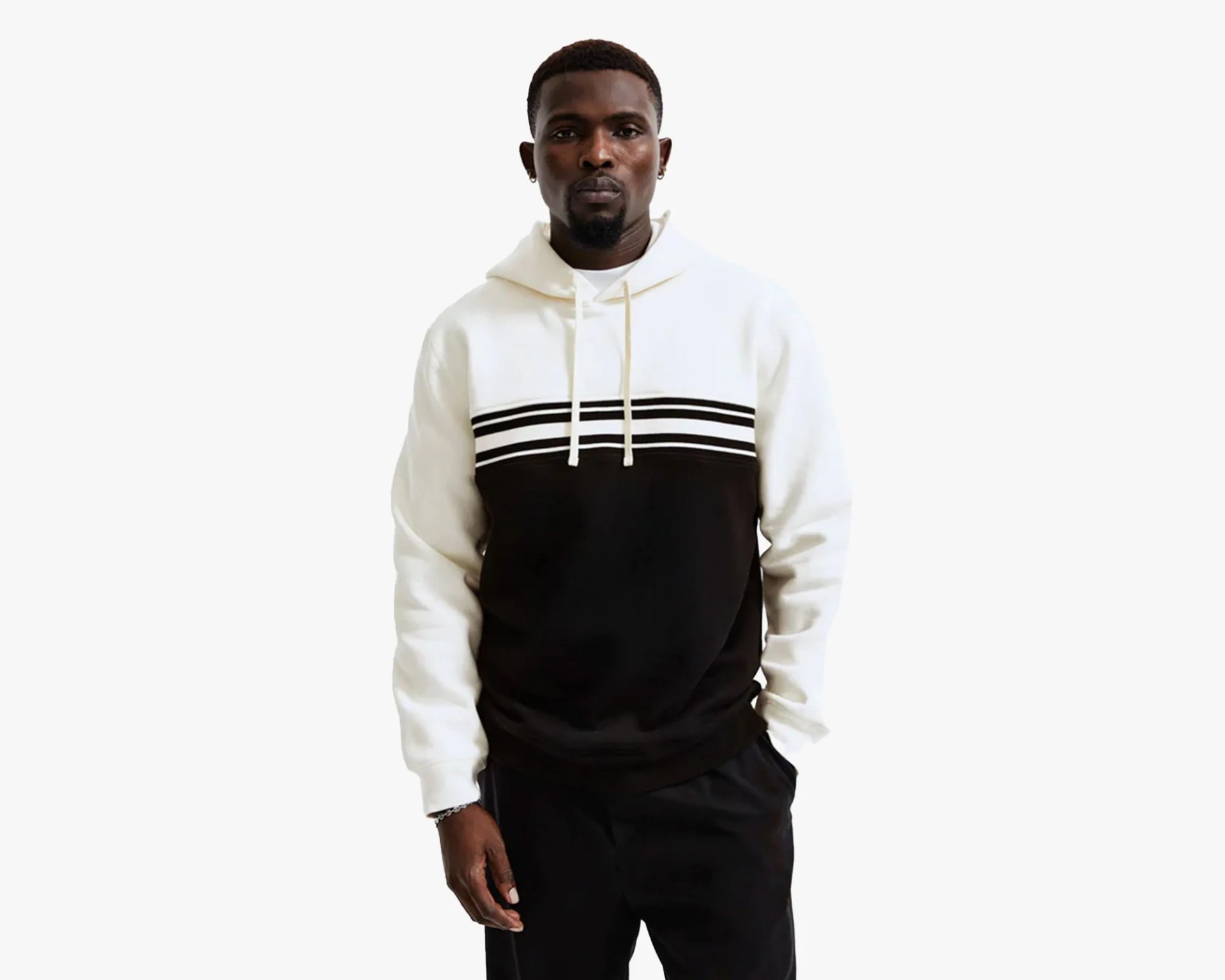 MAN WEARING REIGNING CHAMP MIDWEIGHT FLEECE COLOUR BLOCK HOODIE