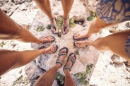 group of hikers in teva sandals from throughout the decades