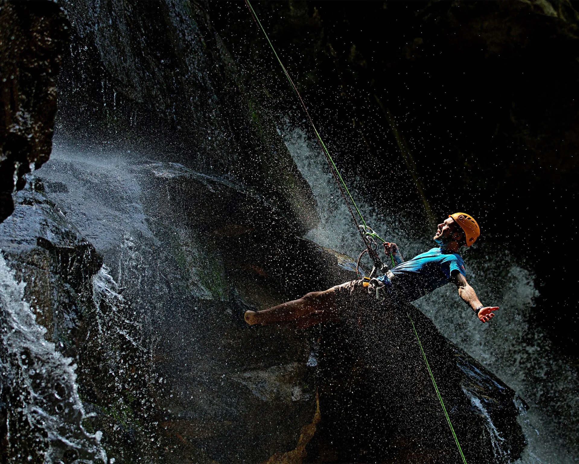 man rappelling down big Bradley falls with green river adventures