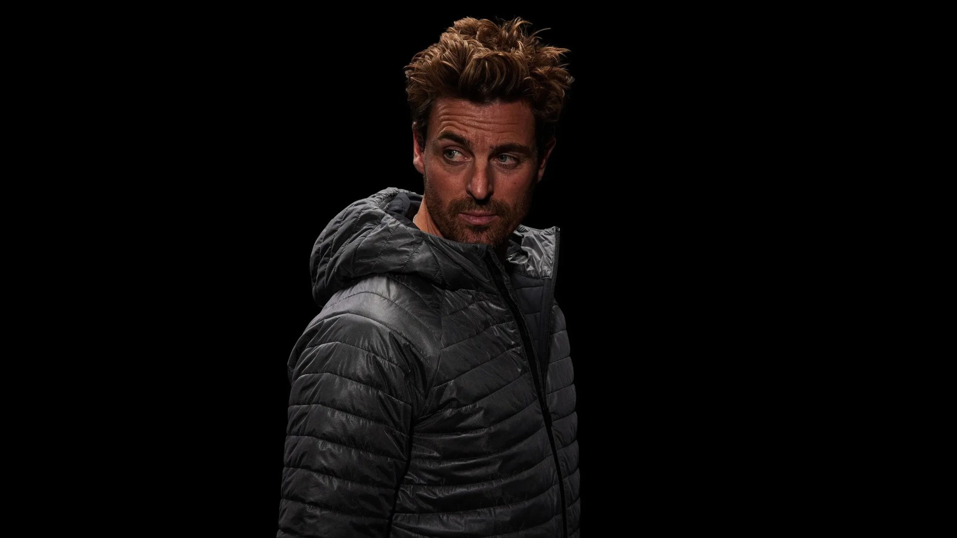 Man wearing Vollebak Double Graphene Lightweight Puffer