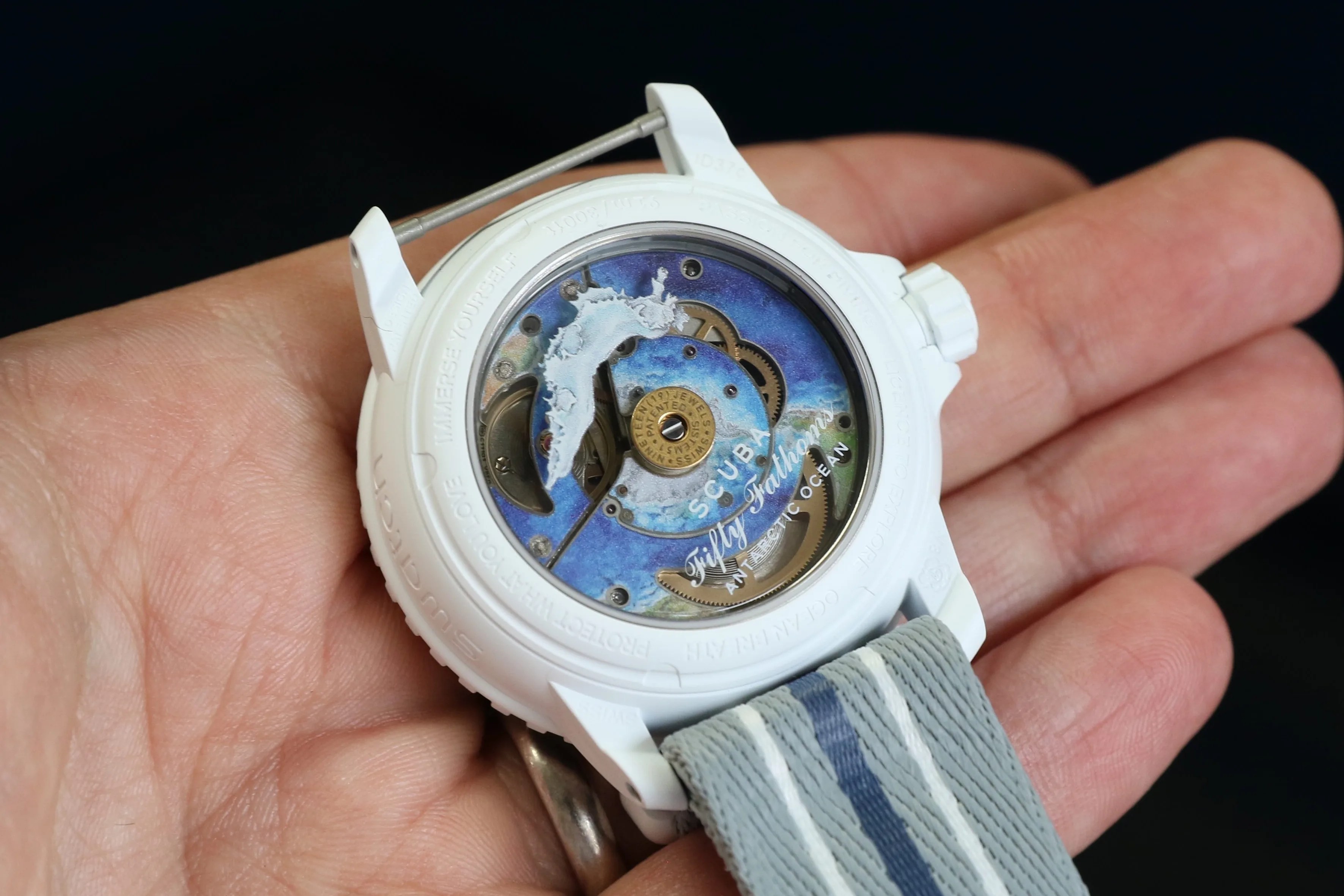 watch movement through a caseback