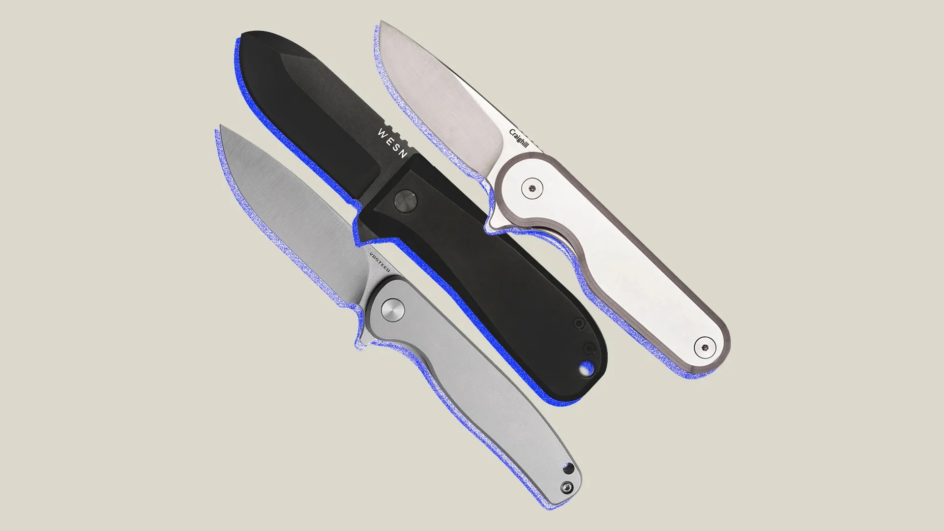 three open pocket knives on a blank background