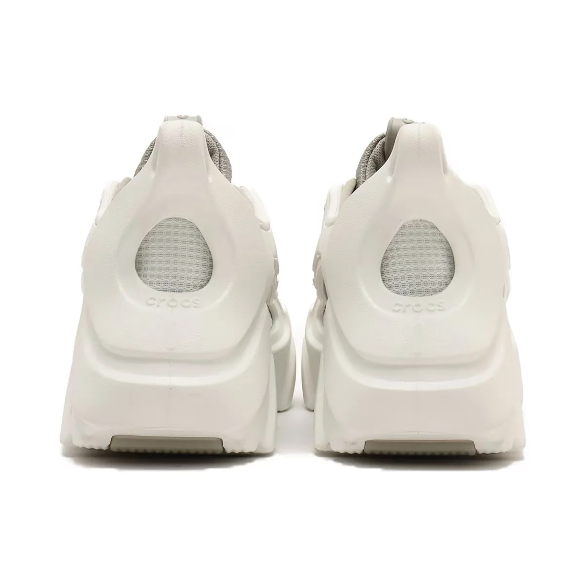 Back view of a pair Crocs Nova Trek sneakers in white