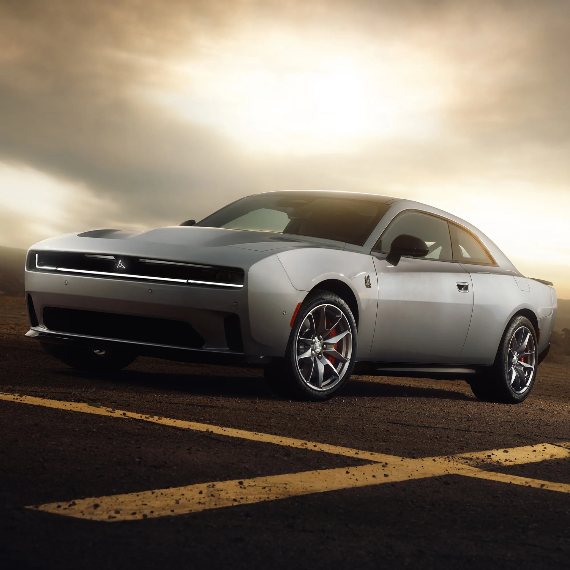 gray 2024 dodge charger daytona on a runway