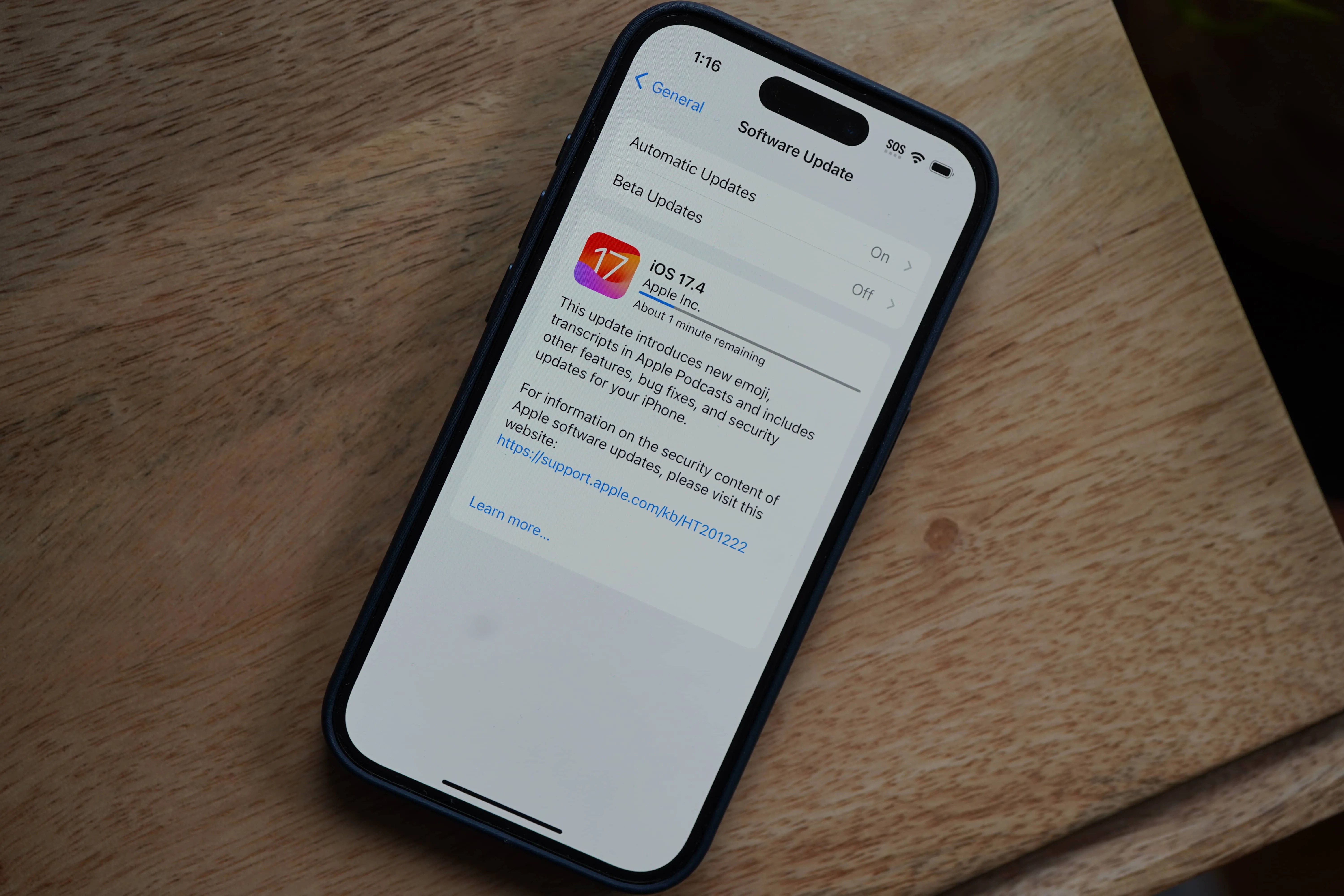 Image of iPhone updating iOS 17.4