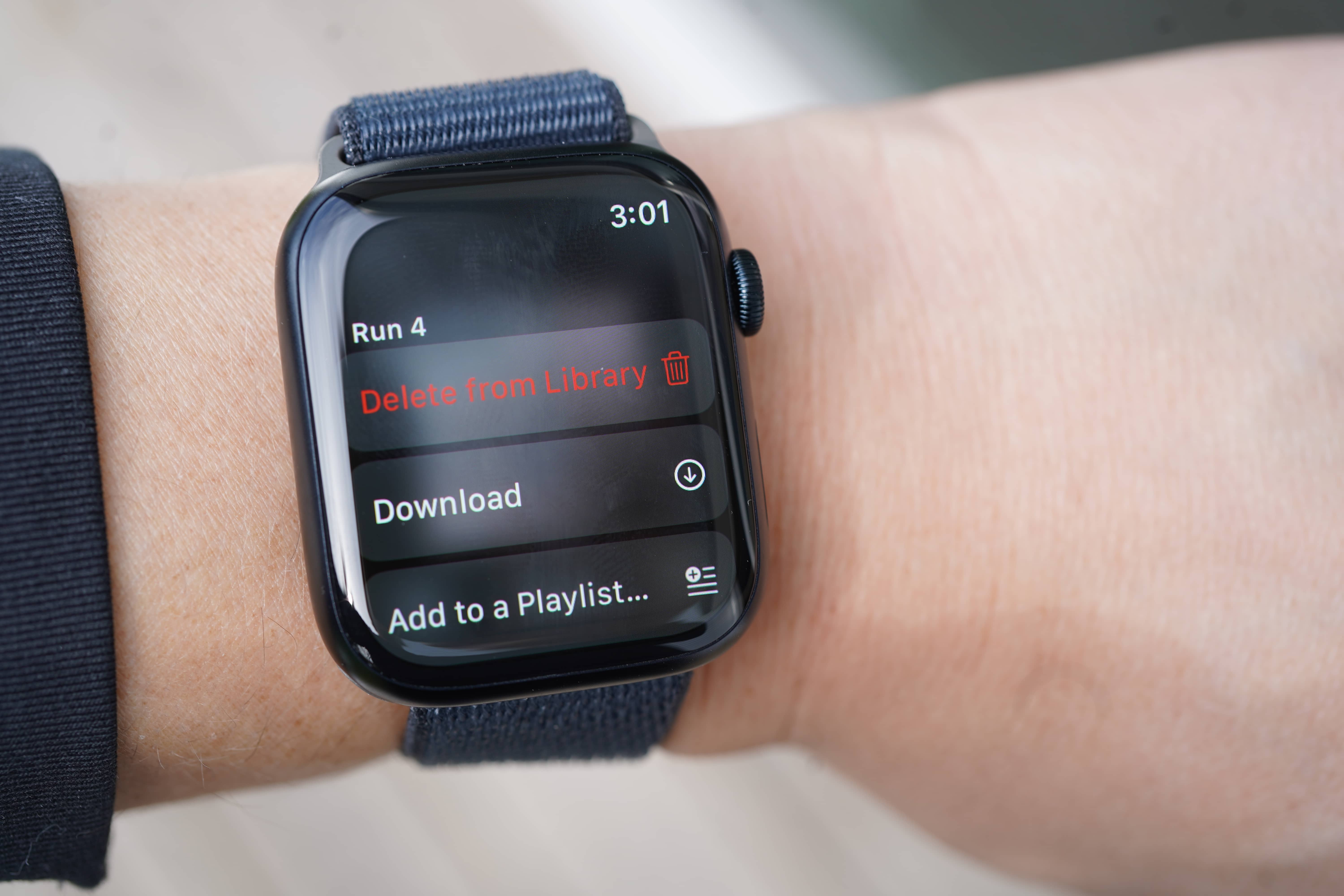 Apple Music playlist download screen on the Apple Watch