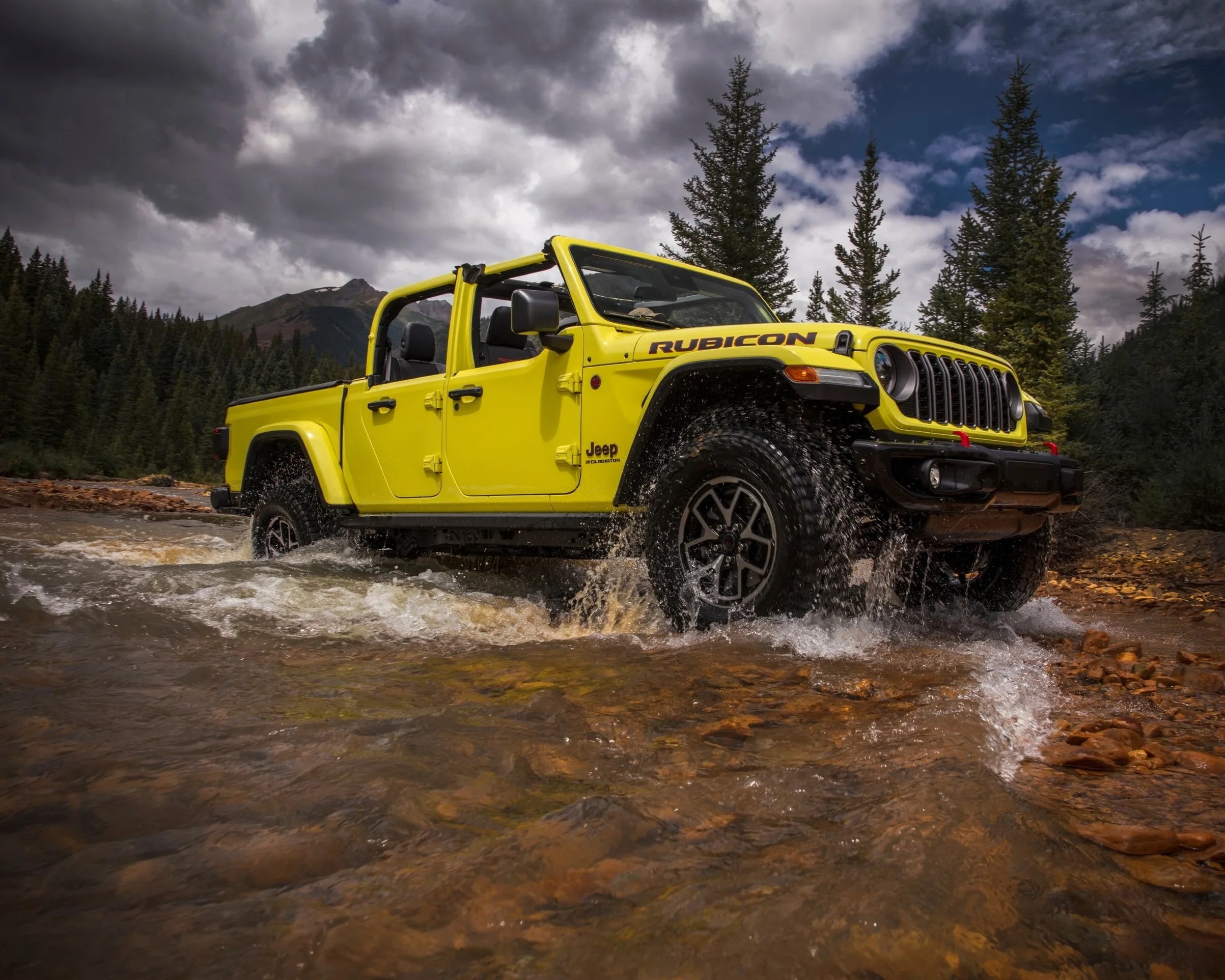 Jeep Gladiator rubicon driving through a river