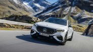 Mercedes AMG E 53 hybrid driving through the mountains.