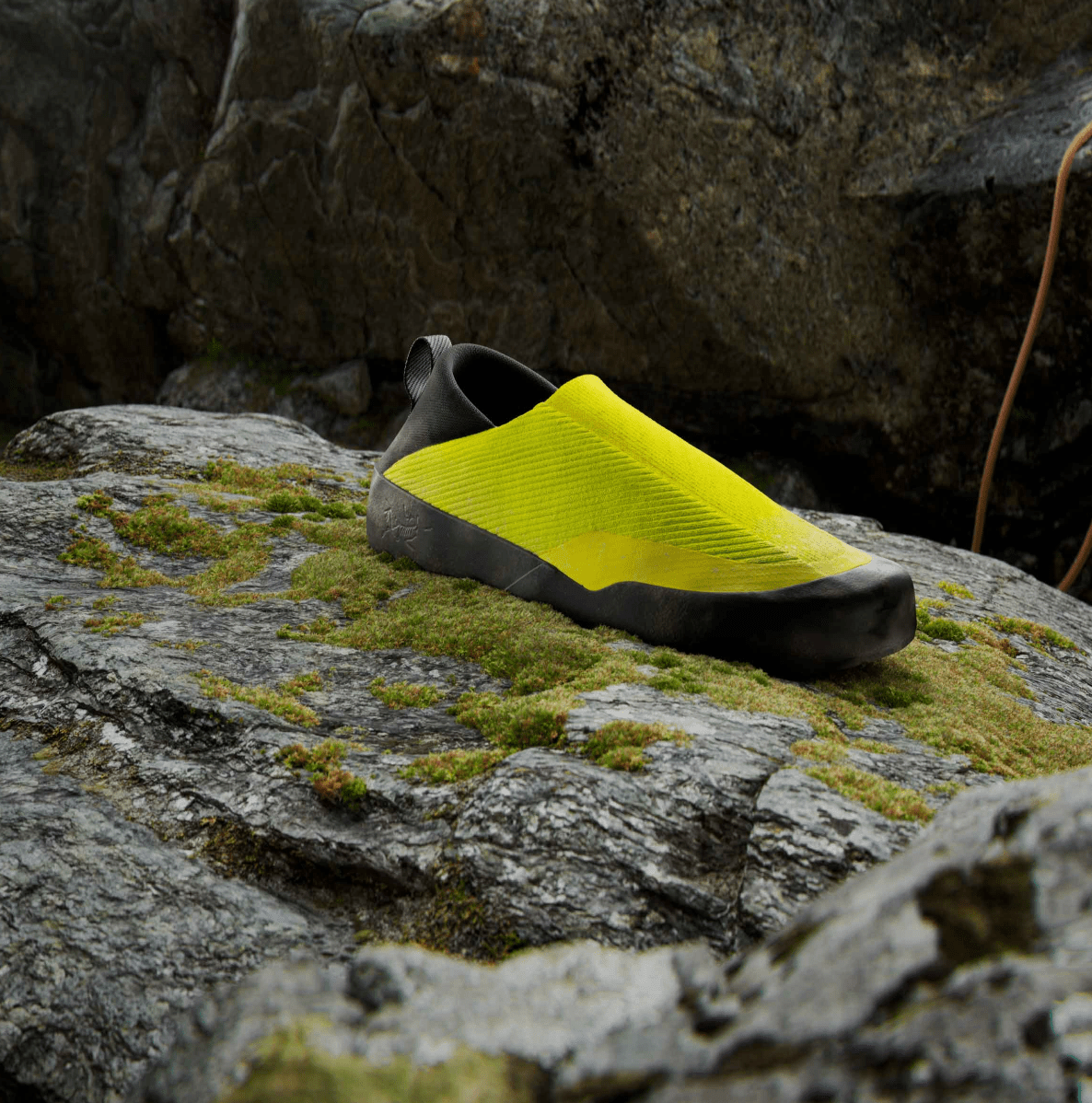 arc'teryx kragg sitting on a mossy rock