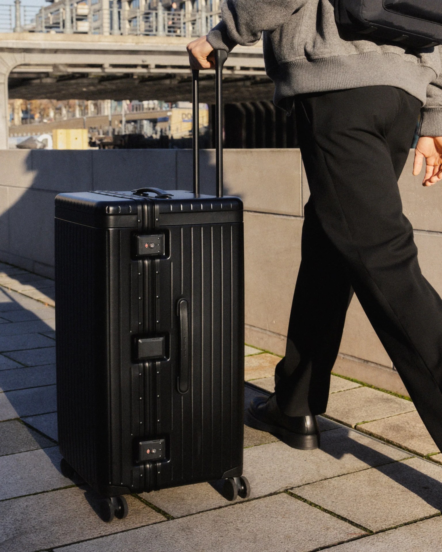 man using Carl Friedrik Trunk suitcase