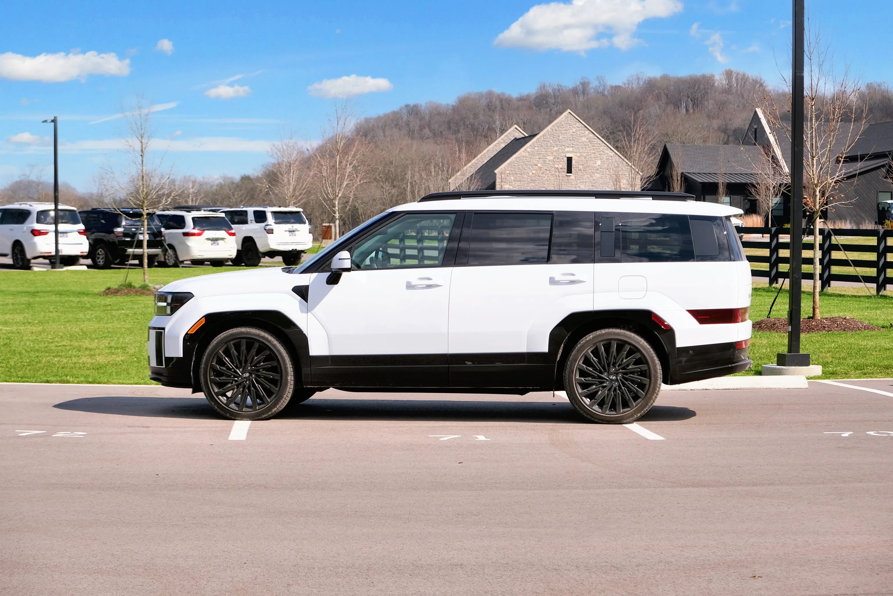 hyundai santa fe from the side in a parking lot