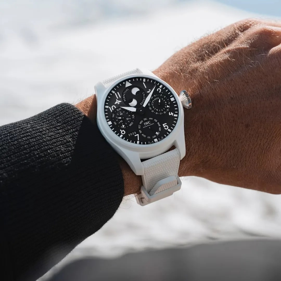 white iwc pilot watch on mans wrist