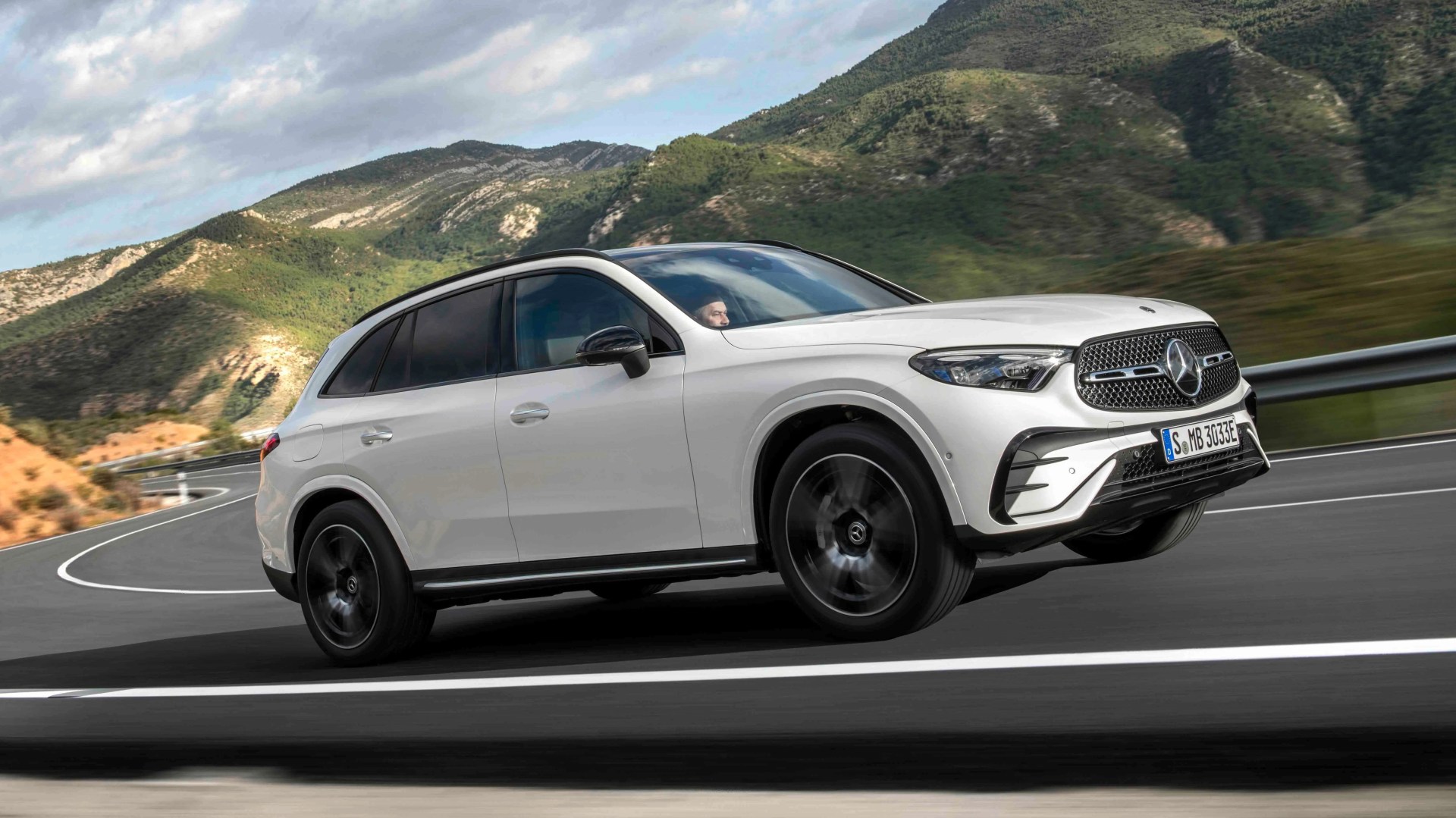 mercedes glc hybrid driving on road