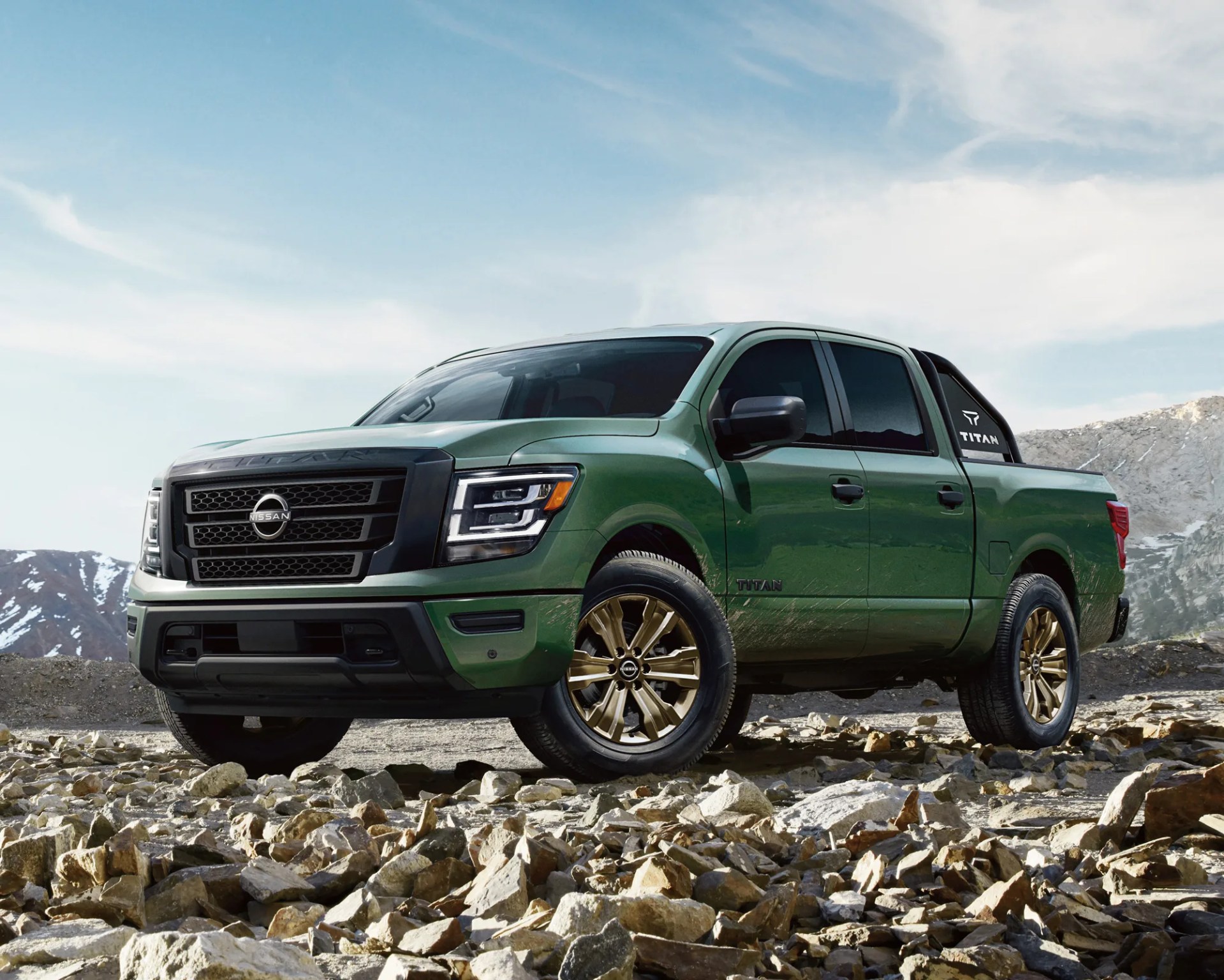 2024 nissan titan sv bronze edition parked on rocks in the desert
