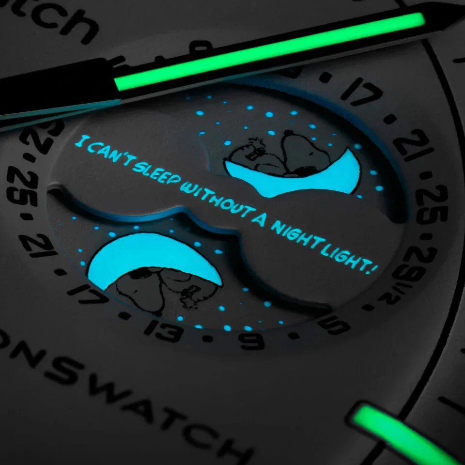 moonswatch moonphase lume with snoopy