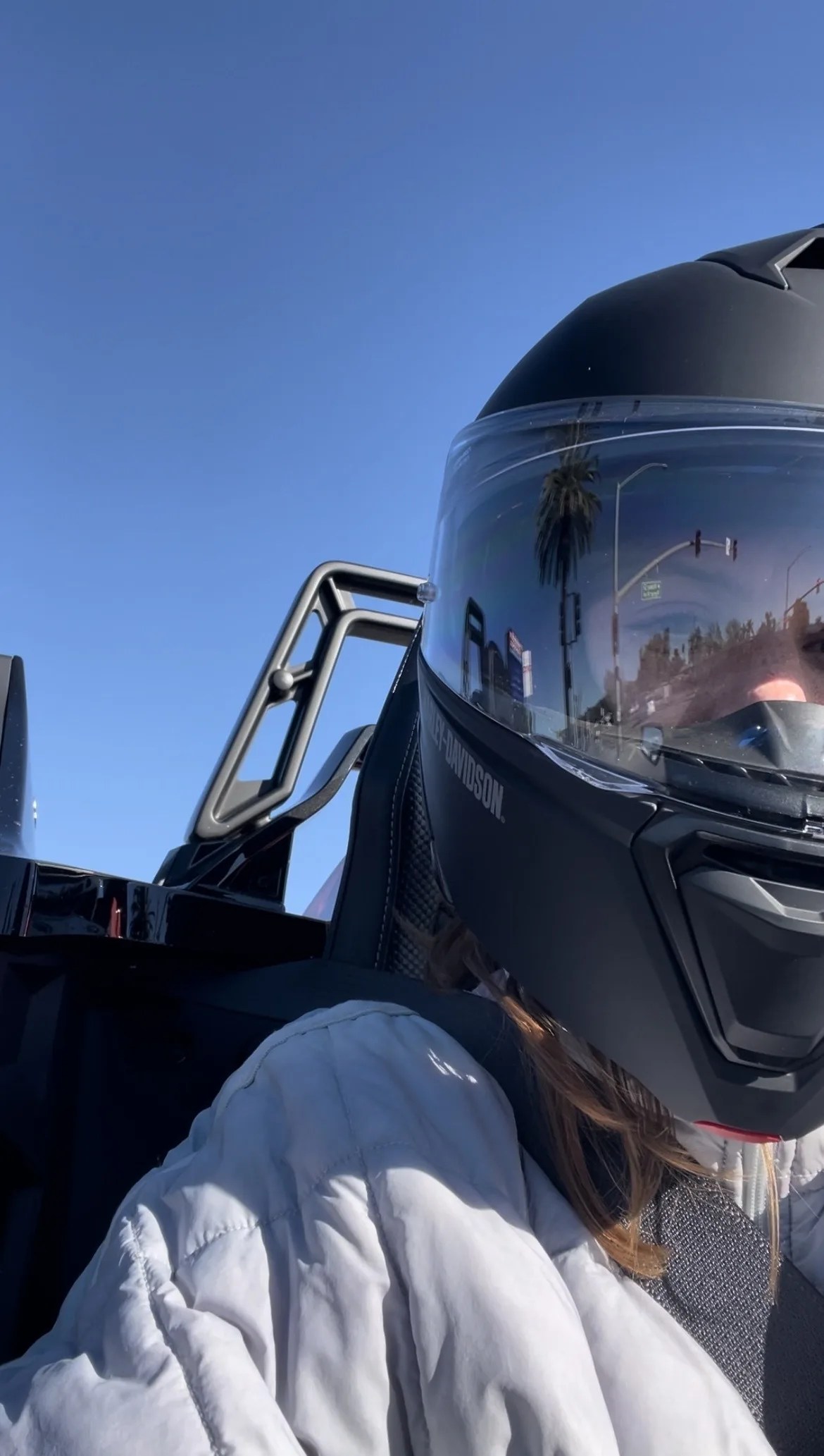 woman driving polaris slingshot r
