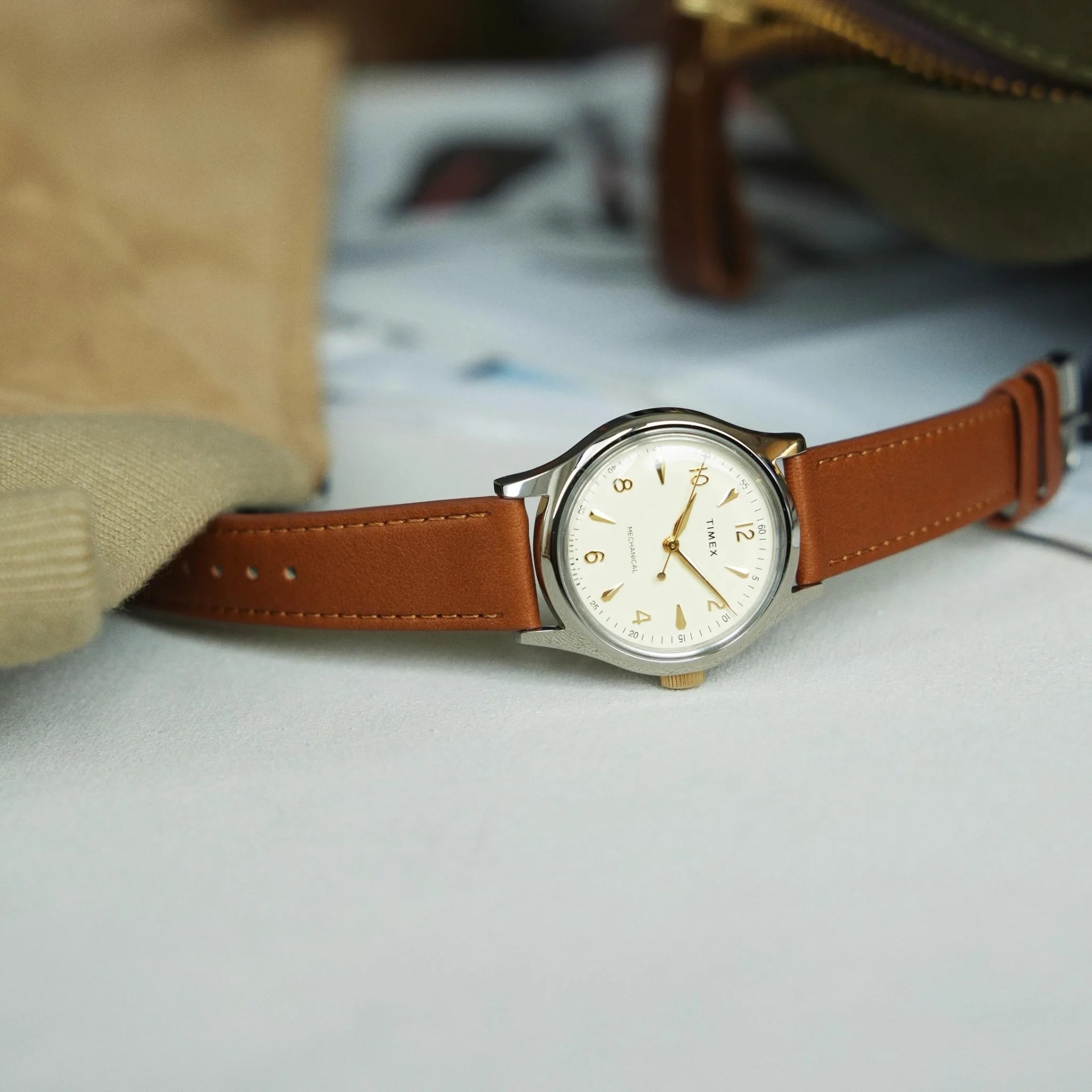 white timex dress watch on a table