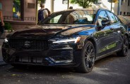 black Volvo parked on new york street