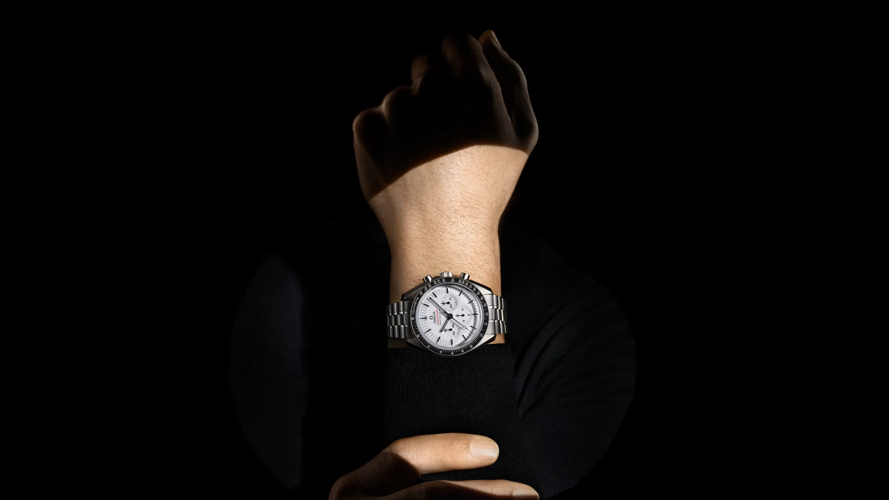 white watch on wrist
