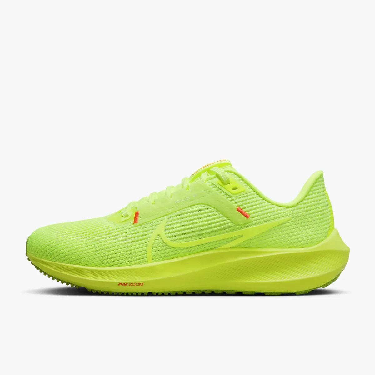 Nike Women's Pegasus 40 running shoe in volt yellow color in profile on white background.