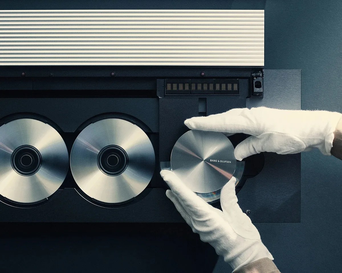 technician restoring a Bang & Olufsen CD player