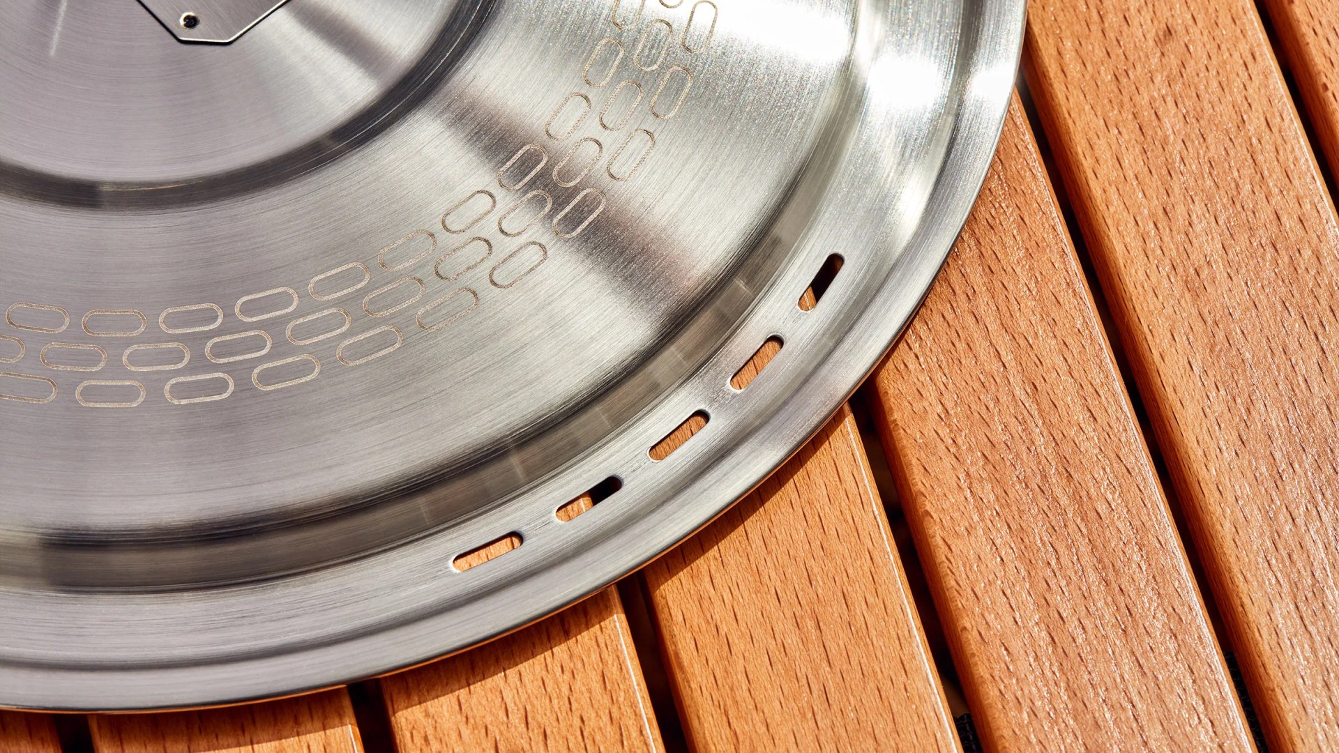 pan lid on wood texture