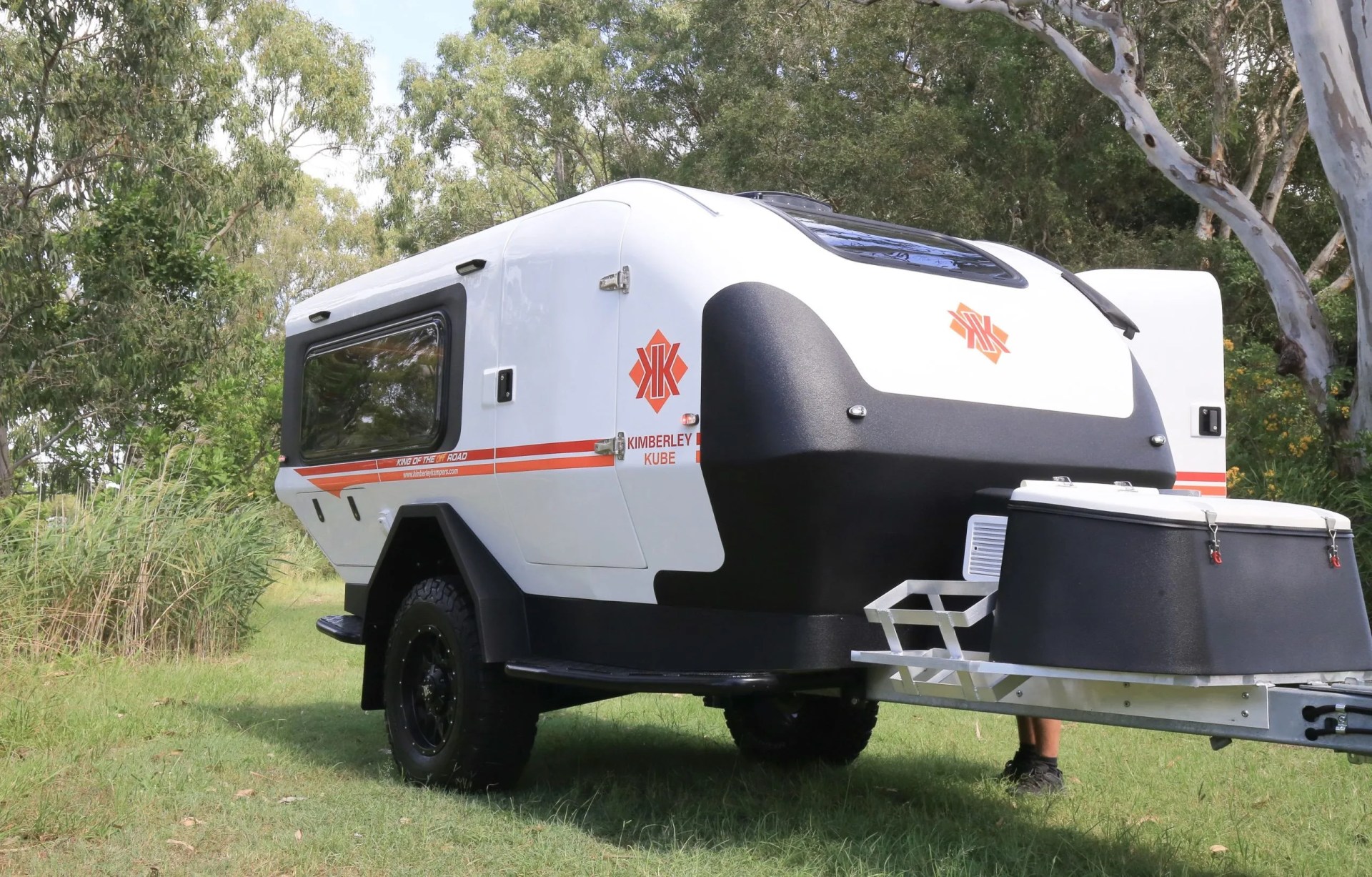 kimberly kampers teardrop camper parked outside seen from a three quarter front view