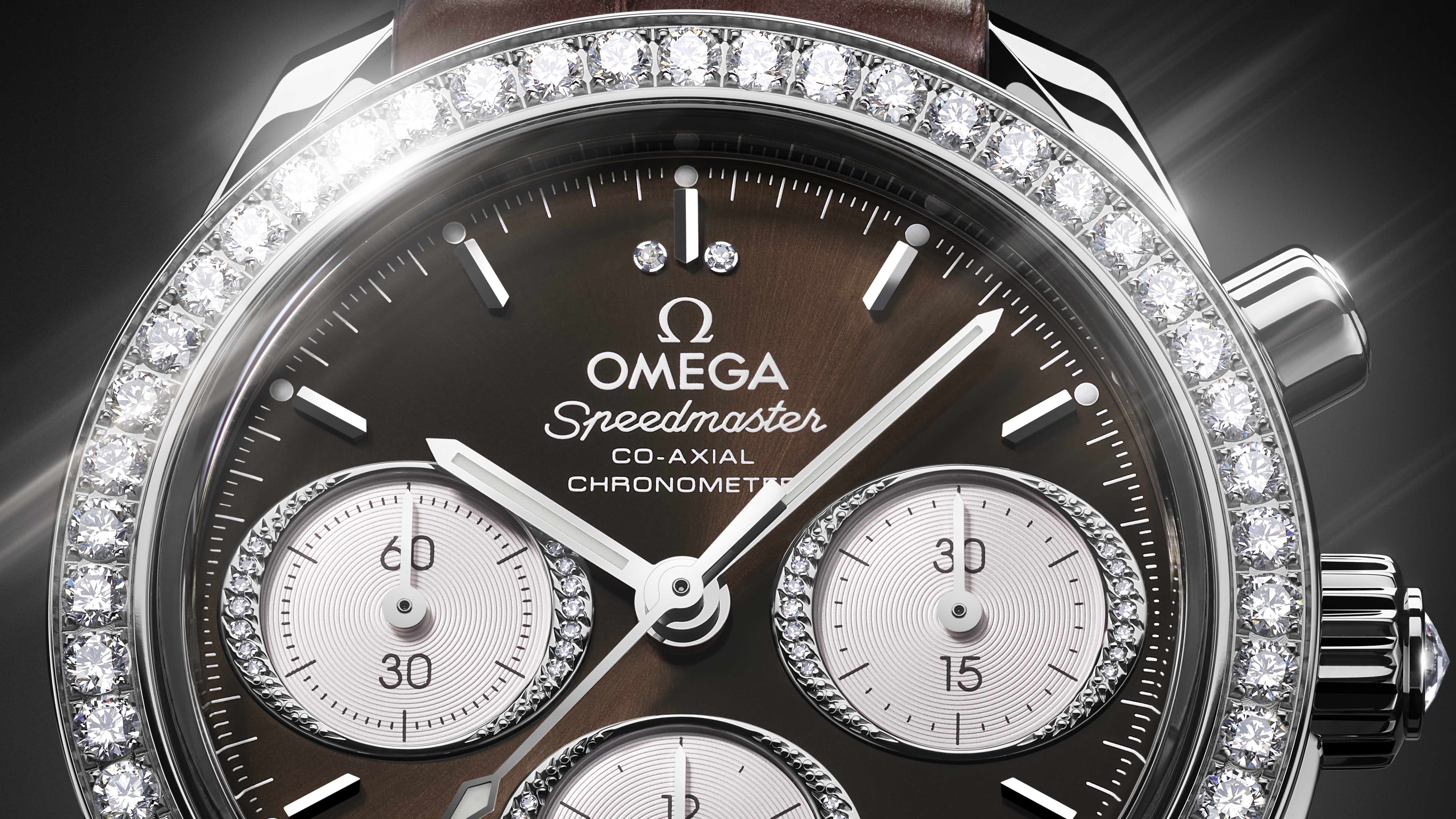 closeup of diamond covered omega watch