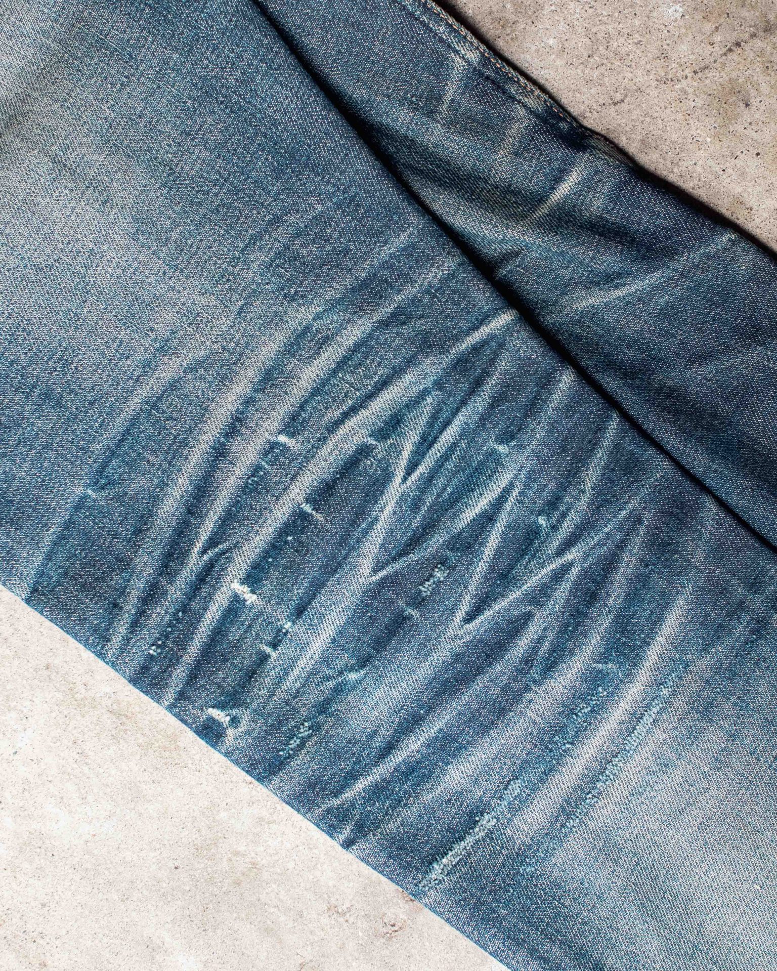 pair of faded jeans