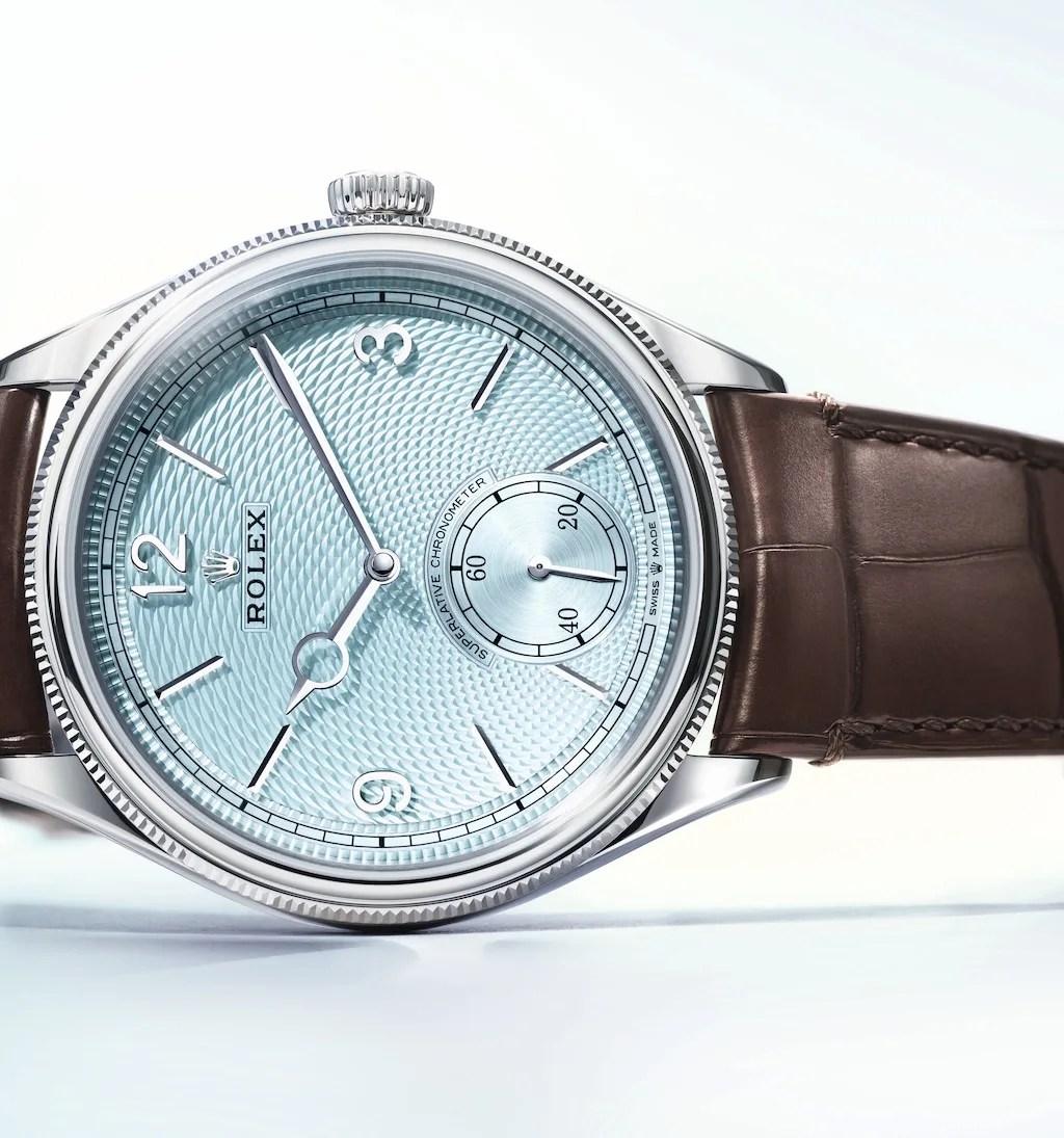 rolex blue watch on leather strap