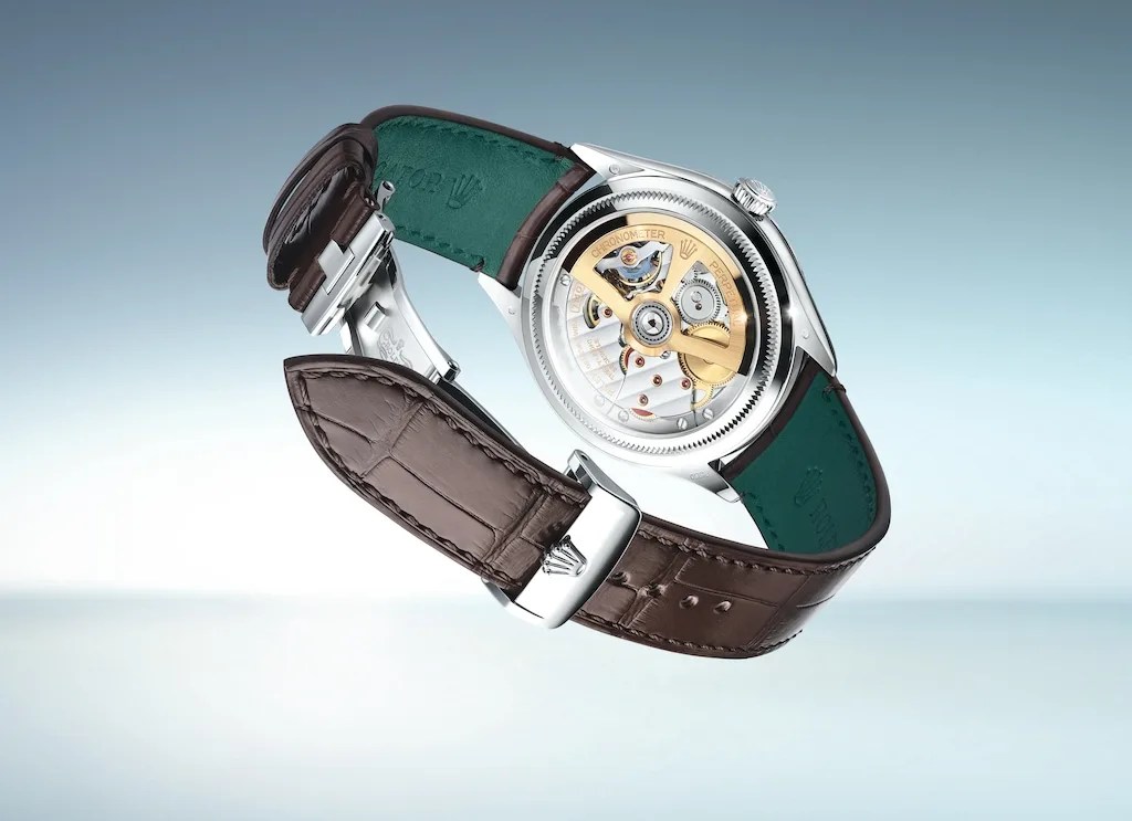 rolex watch movement seen through a display caseback